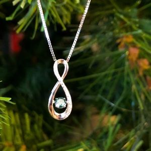 Blue, floating diamond pendant